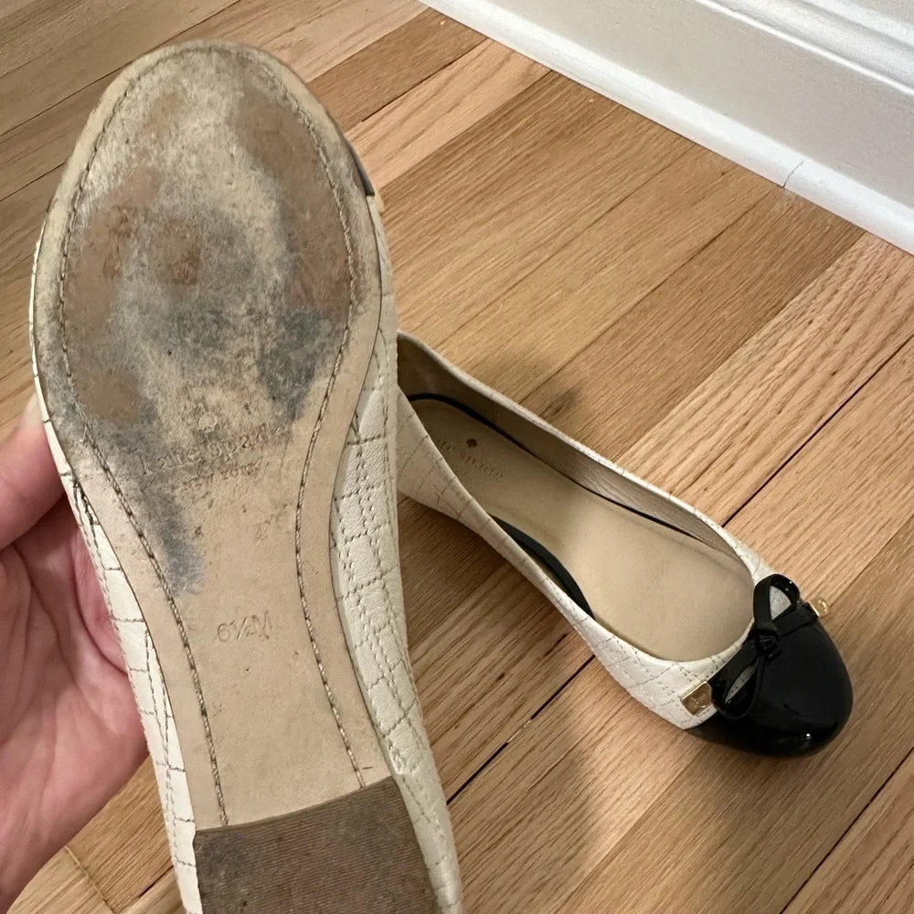 Kate Spade black/white ballet flats with bow accents